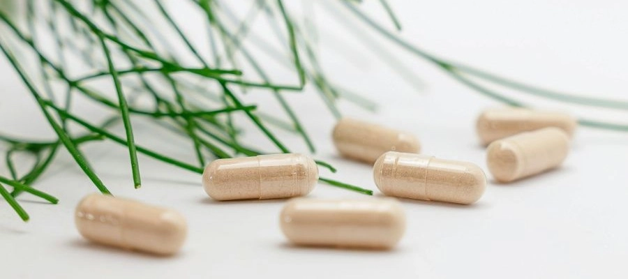 imagem de capsulas de suplemento alimentar como, por exemplo, triptofano